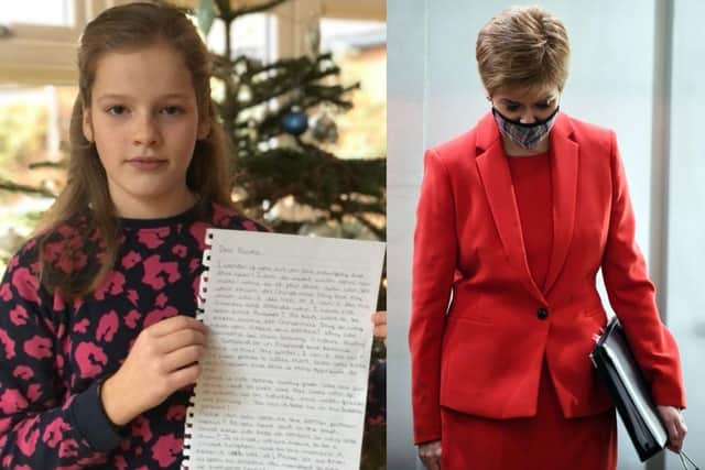 Molly, 10, with her letter addressed to Nicola Sturgeon picture: supplied