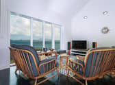 Image sitting back in your luxurious designer living room and enjoying these views at the Sound of Harris.