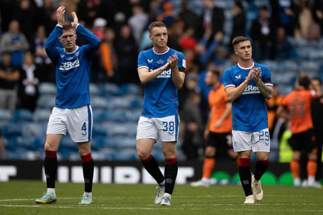 Leon King (middle) applauds the Ibrox fans after Rangers' 2-1 victory over Dundee United (Photo by Craig Williamson / SNS Group)