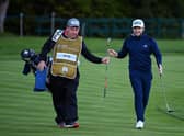 Tyrrell Hatton, right , and caddie Mick Donaghy on the 18th hole during the final round of the BMW PGA Championship at Wentworth. Picture: Ross Kinnaird/Getty Images