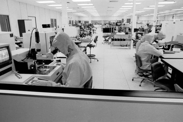 Silicon wafers are inspected in Europe's largest clean room at the Digital Equipment Corporation's electronics factory in Ayr, October 1987.