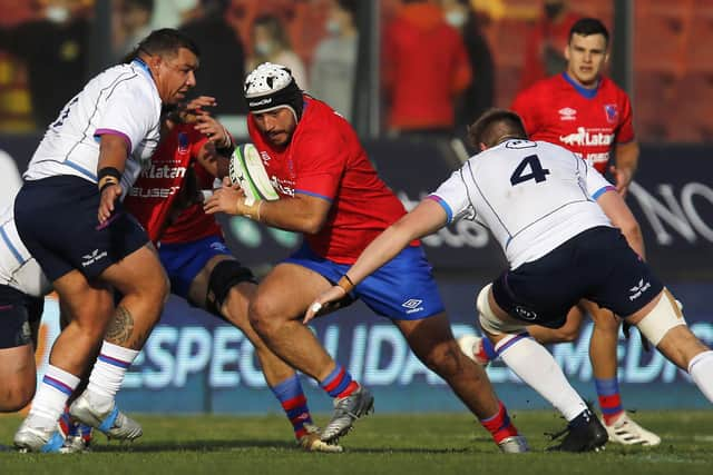 Scotland forwards Javan Sebastian and Jamie Hodgson get ready to stop Vittorio Lastra of Chile. (Photo by Marcelo Hernandez/Getty Images)