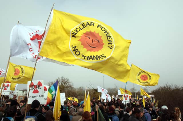 Anti-nuclear protesters demonstrate outside the Hinkley Point nuclear power station near Bridgwater, England (Picture: Matt Cardy/Getty Images)