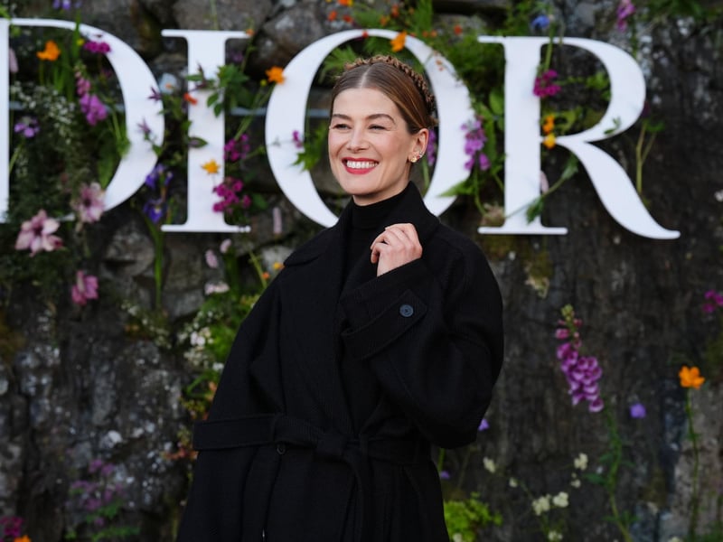 English actress Rosamund Pike attends the Dior Cruise 2025 show at Drummond Castle