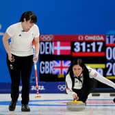 From left, Halley Duff, Eve Muirhead and Jennifer Dodds of Team Great Britain compete against Team Denmark during the Women's Curling Round Robin Session on Day 9 of the Beijing 2022 Winter Olympic Games.