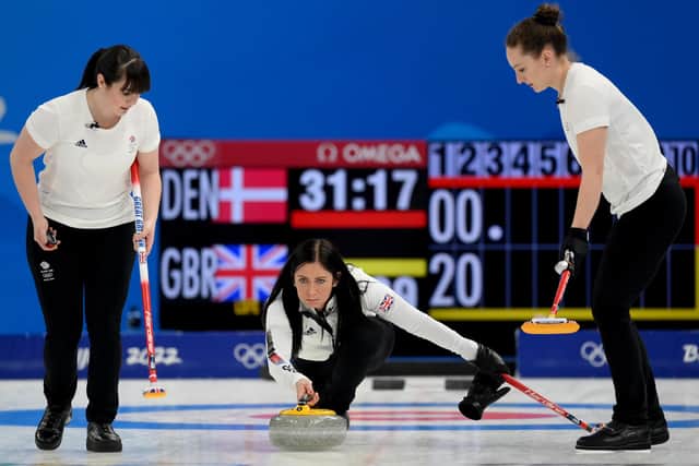From left, Halley Duff, Eve Muirhead and Jennifer Dodds of Team Great Britain compete against Team Denmark during the Women's Curling Round Robin Session on Day 9 of the Beijing 2022 Winter Olympic Games.