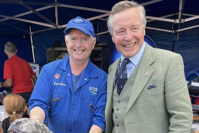 Lord Lieutenant Sandy Manson with Stephen Bruce of Peterhead Fish Company.