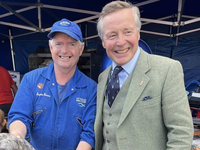 Lord Lieutenant Sandy Manson with Stephen Bruce of Peterhead Fish Company.