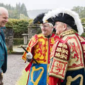 The newly appointed true heir and chief of the Buchanan Clan, John Michael Baillie-Hamilton Buchanan, was heralded in by trumpet fanfare and accompanied by a procession of pipers, banner bearers and twelve fellow clan chiefs.

 

The Chief was ‘crowned’ in traditional fashion with the ‘Balmoral Bonnet’ hat and presented with painstakingly recreated ‘clan jewels’.