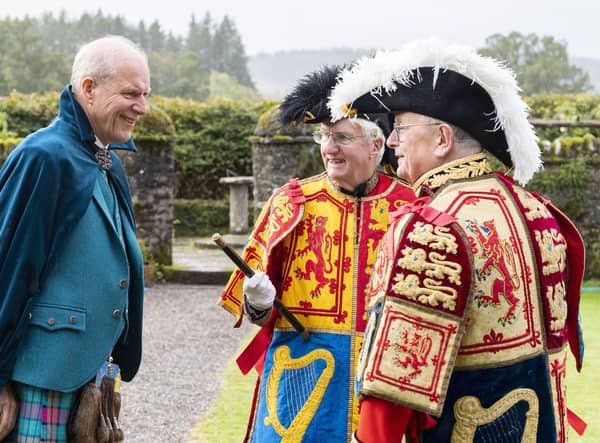 The newly appointed true heir and chief of the Buchanan Clan, John Michael Baillie-Hamilton Buchanan, was heralded in by trumpet fanfare and accompanied by a procession of pipers, banner bearers and twelve fellow clan chiefs.

 

The Chief was ‘crowned’ in traditional fashion with the ‘Balmoral Bonnet’ hat and presented with painstakingly recreated ‘clan jewels’.