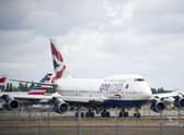The number of passengers using IAG’s airlines remains significantly down on pre-pandemic levels, and fell again during the traditional peak festive season. Picture: Steve Parsons/PA Wire