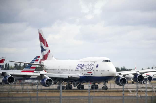 The number of passengers using IAG’s airlines remains significantly down on pre-pandemic levels, and fell again during the traditional peak festive season. Picture: Steve Parsons/PA Wire
