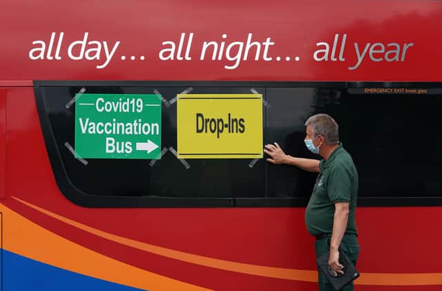 Mobile vaccine buses offer a drop in vaccine service.