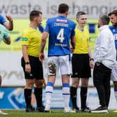 Hibs manager Lee Johnson questions referee Craig Napier at full time following the 1-1 draw with St Johnstone.