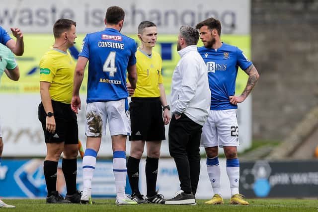 Hibs manager Lee Johnson questions referee Craig Napier at full time following the 1-1 draw with St Johnstone.