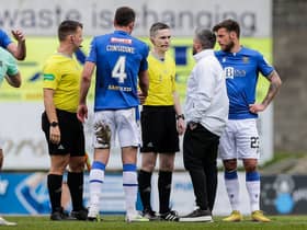 Hibs manager Lee Johnson questions referee Craig Napier at full time following the 1-1 draw with St Johnstone.