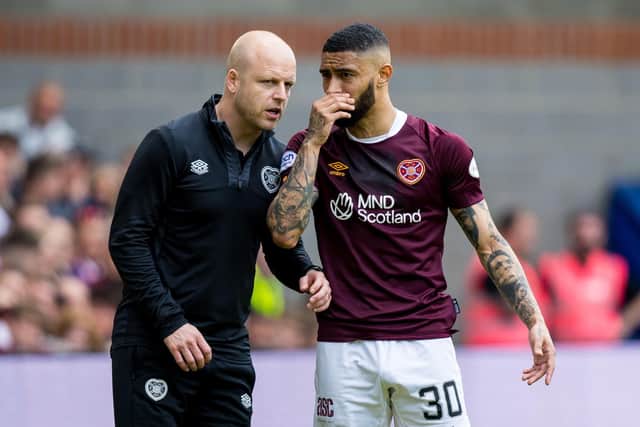 Hearts manager Steven Naismith (left) speaks with Josh Ginnelly during the 1-1 draw with Hibs on May 27. (Photo by Ross Parker / SNS Group)