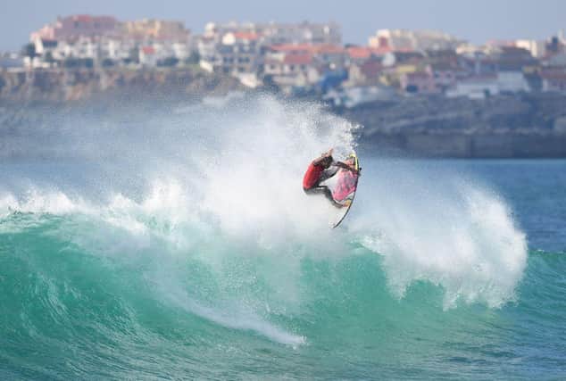 A surfer at Supertubos beach near Peniche, central Portugal in 2018 (Photo: FRANCISCO LEONG/AFP via Getty Images)
