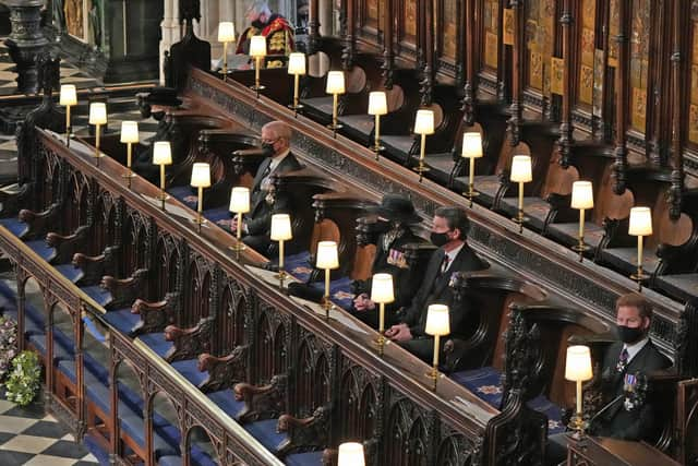 Queen Elizabeth II , the Duke of York, the Princess Royal, Vice Admiral Sir Timothy Laurence and the Duke of Sussex in St George's Chapel.