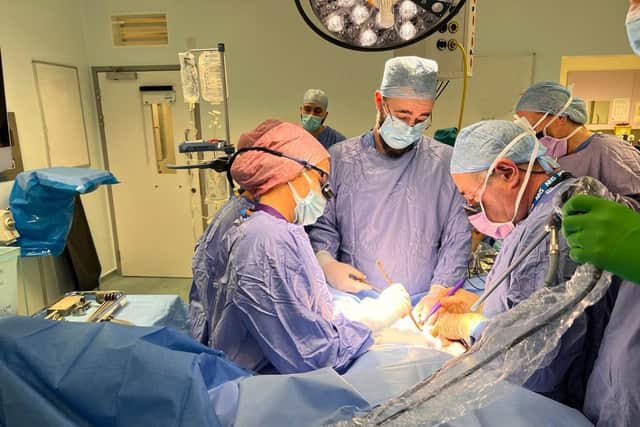 Isabel Quigora and Scottish surgeon Richard Smith (right) performing a womb transplant on a 34-year-old woman. Picture: Womb Transplant UK/PA Wire