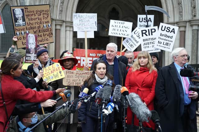 Stella Moris, the partner of Julian Assange, speaks to the media outside the Royal Courts of Justice in London, after the Wikileaks founder won the first stage of his bid to appeal against the decision to extradite him to the United States to the Supreme Court.