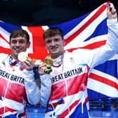 Great Britain's Tom Daley (left) and Matty Lee celebrate winning gold in the Men's Synchronised 10m Platform Final at the Tokyo Aquatics Centre. Picture: Adam Davy/PA Wire