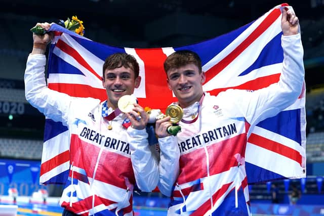 Great Britain's Tom Daley (left) and Matty Lee celebrate winning gold in the Men's Synchronised 10m Platform Final at the Tokyo Aquatics Centre. Picture: Adam Davy/PA Wire