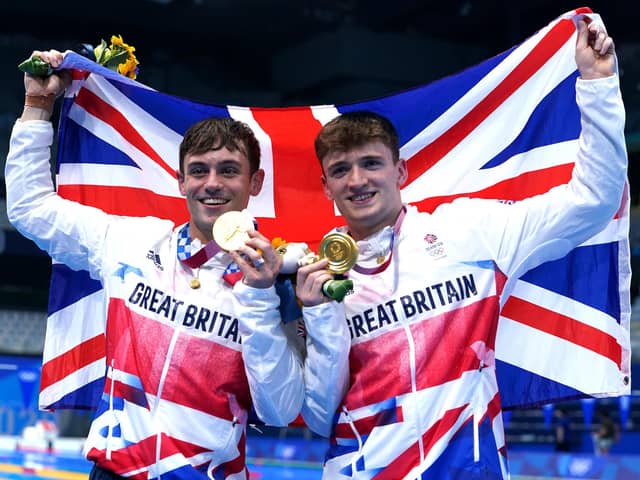 Great Britain's Tom Daley (left) and Matty Lee celebrate winning gold in the Men's Synchronised 10m Platform Final at the Tokyo Aquatics Centre. Picture: Adam Davy/PA Wire