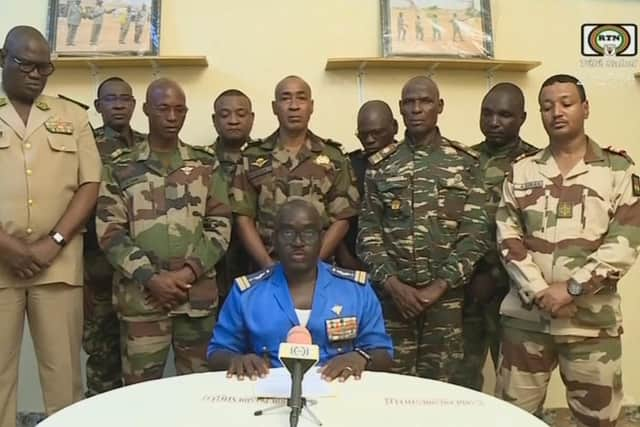 This image from ORTN - Télé Sahel shows Colonel Major Amadou Abdramane, spokesperson for the National Committee for the Salvation of the People, speaking during a televised statement. Soldiers claimed to have overthrown the government of Niger President Mohamed Bazoum in a statement read out on national television, after a day in which the leader was detained in his official residence.