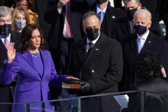 Kamala Harris is sworn in as US Vice-President as her husband Doug Emhoff and President-elect Joe Biden look on (Picture: Alex Wong/Getty Images)