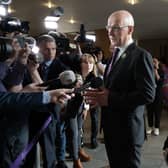 John Swinney and Kate Forbes speak to journalists after First Minister's Questions (Photo by Lesley Martin/PA Wire)