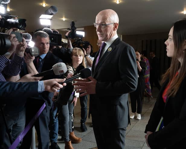 John Swinney and Kate Forbes speak to journalists after First Minister's Questions (Photo by Lesley Martin/PA Wire)