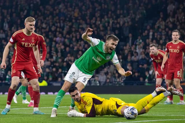 Montgomery feels Hibs should have been awarded a penalty for this incident involving  Dylan Vente.