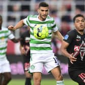 Celtic's Israeli forward Liel Abada (L) and Midtjylland's Brazilian midfielder Ferreira Evander vie for the ball during the UEFA Champions League second round qualifying match on July 28, 2021. (Photo by BO AMSTRUP/Ritzau Scanpix/AFP via Getty Images)