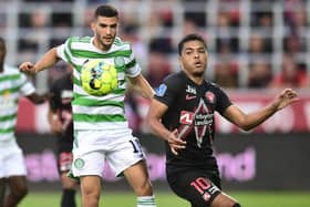 Celtic's Israeli forward Liel Abada (L) and Midtjylland's Brazilian midfielder Ferreira Evander vie for the ball during the UEFA Champions League second round qualifying match on July 28, 2021. (Photo by BO AMSTRUP/Ritzau Scanpix/AFP via Getty Images)