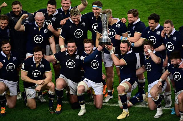Scotland players celebrate with the Auld Alliance Trophy after the win over France in Paris. How many of them will be on the Lions plan to South Africa this summer?