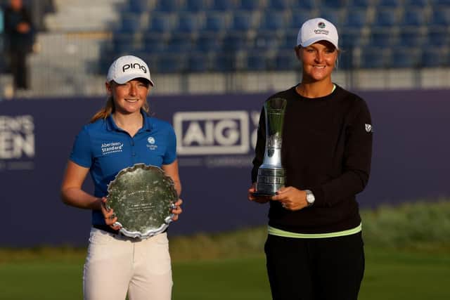 Leading amateur Louise Duncan and AIG Women's Open winner Anna Nordqvist show off their trophies at Carnoustie. Picture: Andrew Redington/Getty Images.