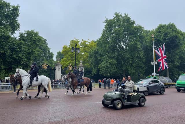 Crowds begin to gather ahead of the Platinum Jubilee Pageant outside Buckingham Palace