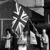 Ron Hill starts the climb at Portobello with flags flying - he went on to win Gold medal.