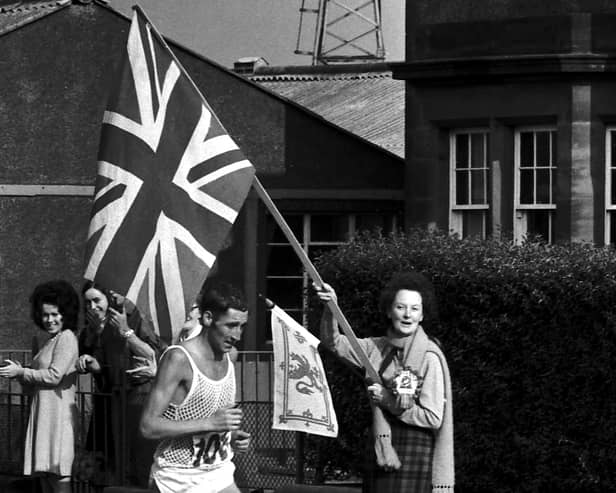 Ron Hill starts the climb at Portobello with flags flying - he went on to win Gold medal.
