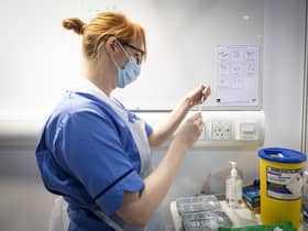A nurse prepares a Covid-19 vaccine. Picture: PA Media