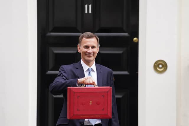 Chancellor of the Exchequer Jeremy Hunt leaves 11 Downing Street, London, with his ministerial box, before delivering his Budget at the Houses of Parliament.