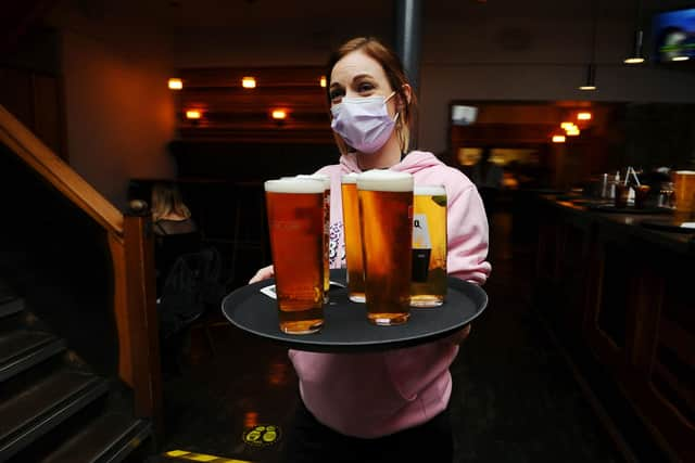 Serving again at . Behind the Wall -  Lesley Dylo 35, restaurant supervisor from Stenhousemuir. (Pic: Michael Gillen)