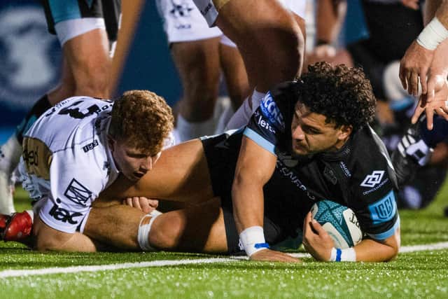 Glasgow Warriors centre Sione Tuipulotu scores a first half try against Dragons. (Photo by Ross MacDonald / SNS Group)