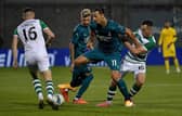 Hearts target Aaron McEneff (No.10) tussles with AC Milan's Zalatan Ibrahimovic earlier this season. Pic: Getty Images.