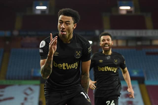 Jesse Lingard scored twice on his West Ham United debut against Aston Villa.