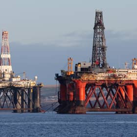 An oil platform standing amongst other rigs. PIC: Andrew Milligan/PA Wire