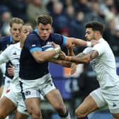 Huw Jones crossed the whitewash twice for Scotland against France in Paris.