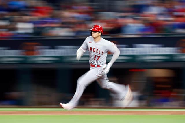 Shohei Ohtani of the Los Angeles Angels rounds the bases after hitting a double against the Texas Rangers. Picture: Tom Pennington/Getty Images