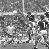 Gordon McQueen soars above the England defence to score in Scotland's victory at Wembley in 1977. Picture: Denis Straughan